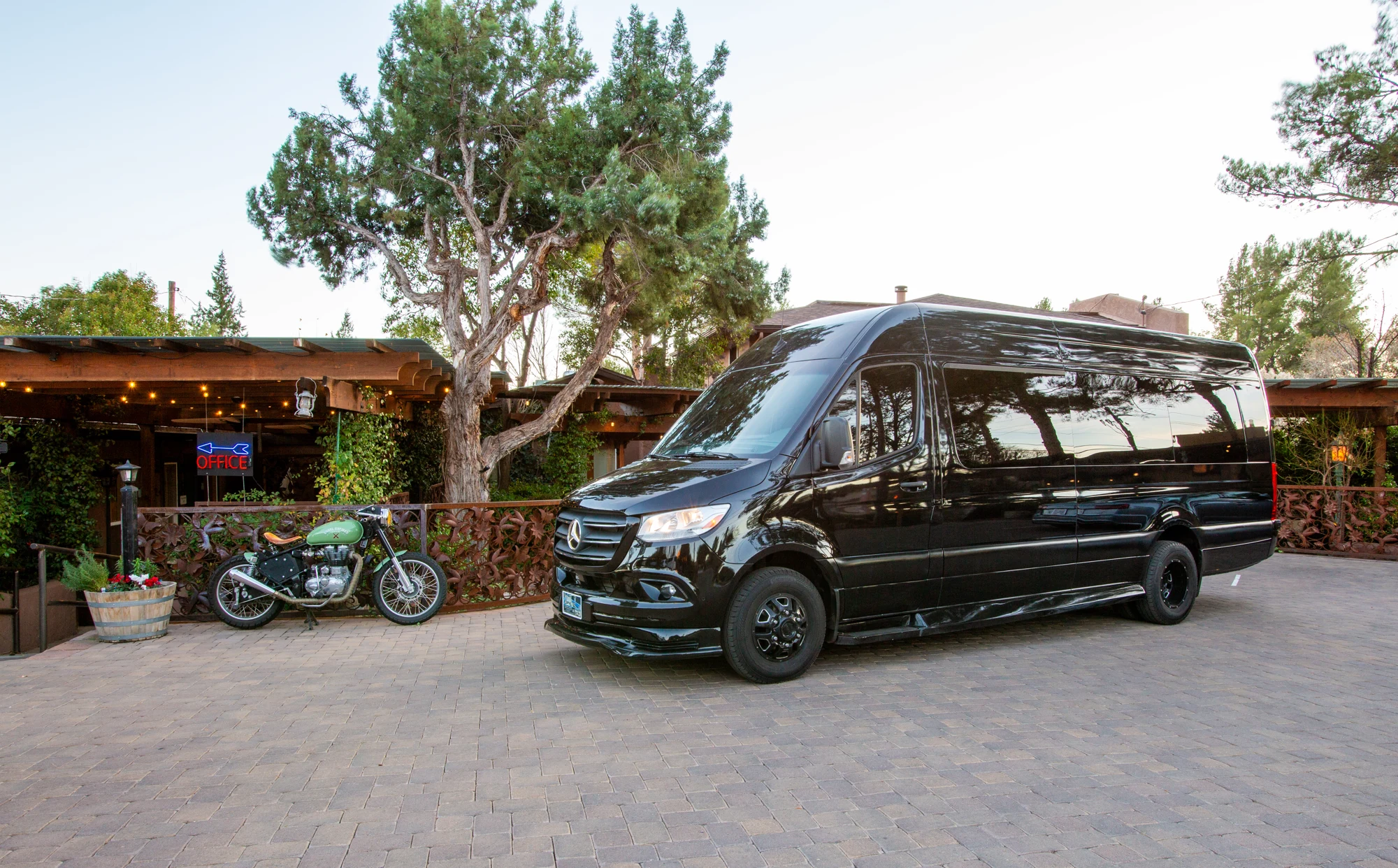 Black executive Mercedes-Benz Sprinter arriving in Sedona